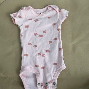 pink onesie with sheep